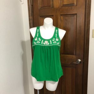 Bright green tank top with embroidered flowers